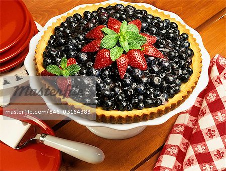 BLUEBERRY TART WITH STRAWBERRIES AND MINT LEAF