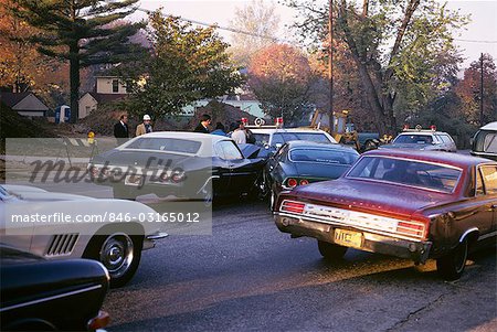 1970s POLICE AT SCENE OF AUTOMOBILE ACCIDENT COLLISION