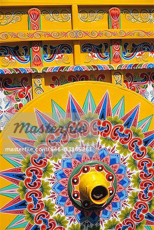 COLORFULLY PAINTED OXCART WHEEL AT STORE SARCHI COSTA RICA