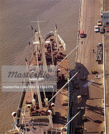 1970s FREIGHTER BEING LOADED WITH CARGO PHILADELPHIA SHIPYARDS FROM ABOVE