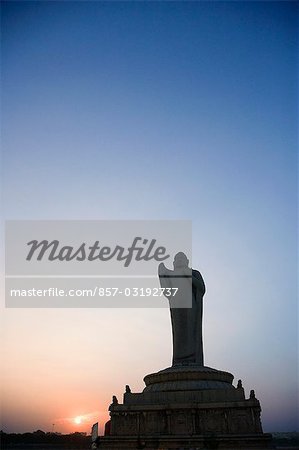 Low angle view of a statue of Buddha, Hussain Sagar, Hyderabad, Andhra Pradesh, India
