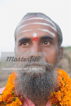 Close-up of a sadhu thinking, Hampi, Karnataka, India