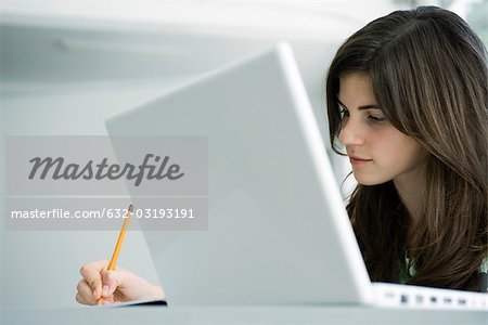 High school student busy with homework