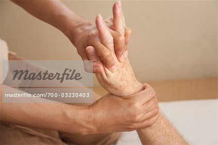 Woman performing Thai Massage, Bangkok, Thailand