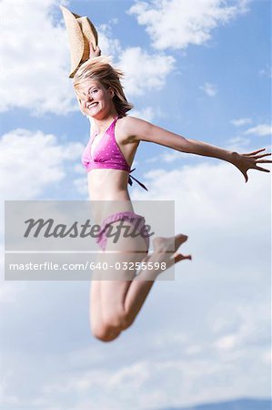 Woman leaping in air