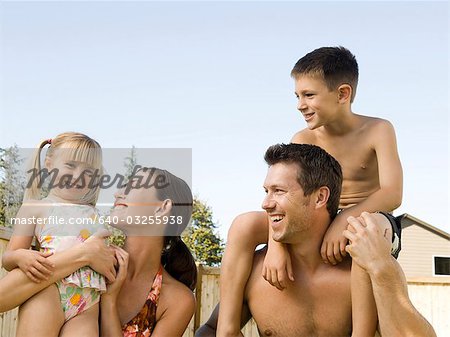 Family posing outdoors