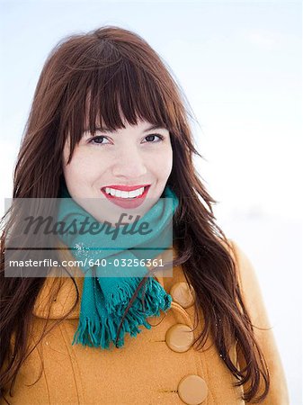 Orem, Utah, USA, young woman in turquoise scarf and red lipstick smiling, portrait