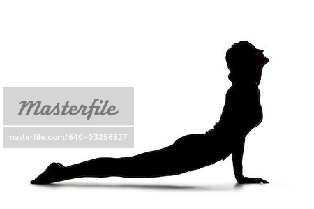 USA, Utah, Orem, Silhouette of woman in cobra pose against white background