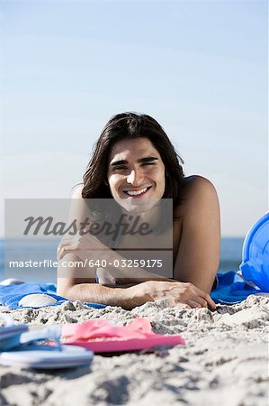 Man lying on the beach