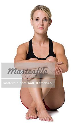 Woman sitting with legs crossed