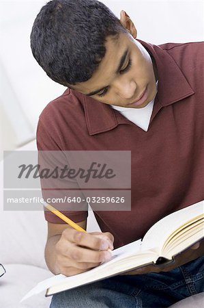 Teenage boy studying