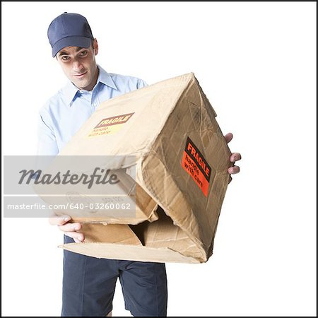 Deliveryman holding a damaged parcel