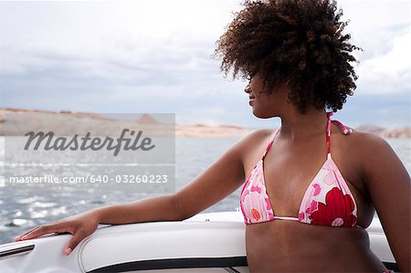 Woman in bikini on boat