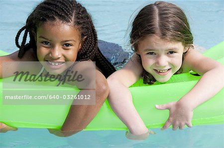 Girls on floatation device