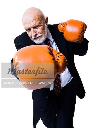 Homme d'affaires avec des gants de boxe