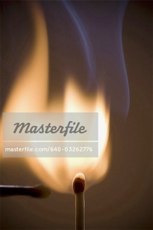 Closeup of burning match
