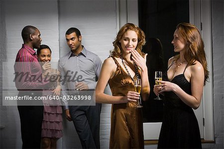 Partygoers socializing