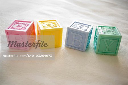 Blocks spelling out baby