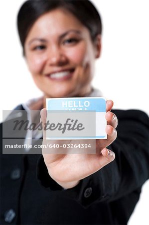 Close-up of woman with blank name tag