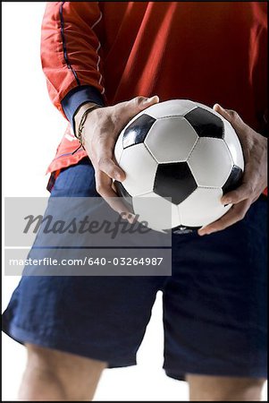 Aine de soccer player holding