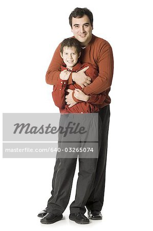 Father playing and posing with son