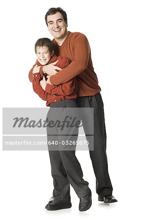 Father playing and posing with son