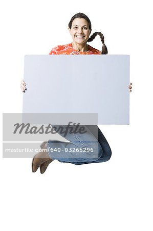 Woman holding a blank sign