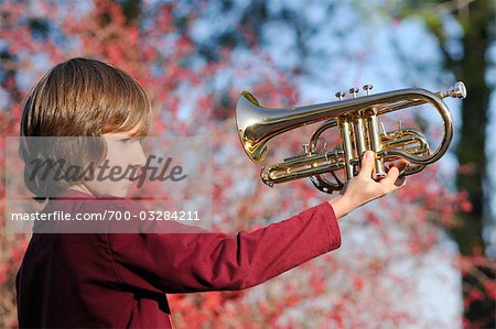 Close-up of Boy Holding Trumpet