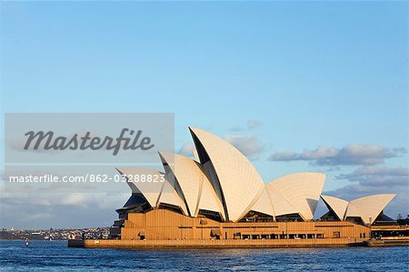 Afternoon light illuminates the iconic Sydney Opera House at Bennelong Point