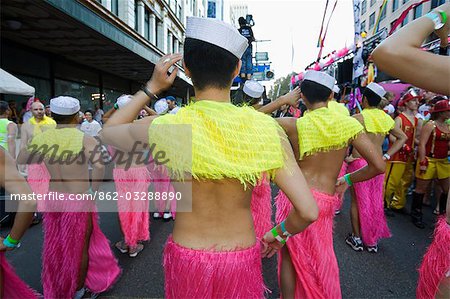 The Asian Marching Boys - a parade entry in the annual Gay and Lesbian Mardi Gras Parade - practice their dance moves on the streets of Sydney