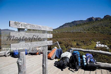 Hikers on the Overland Track leave their heavy packs behind before setting off on the ascent of Mount Ossa,Tasmania's highest mountain at 1614m