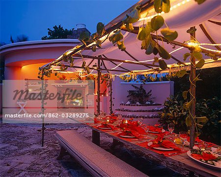 Dinner outside in the garden of Little Whale House,Little Whale Cay