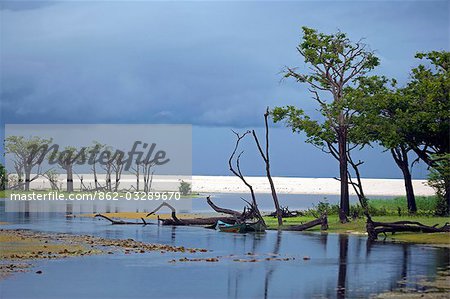 Dramatic stormy light over the banks of the Tapajos river,a tributary of the Amazon River in the Amazonas region of Brazil