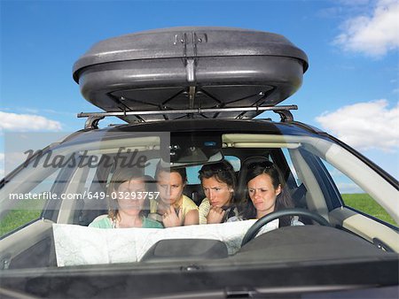 girls looking at map