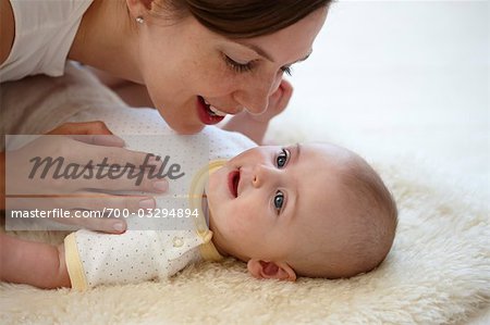 Mother Playing with Baby