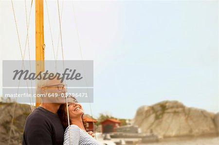 Middle aged couple on an old boat