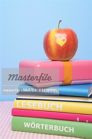Apple on Stack of Books