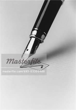 Tip of fountain pen marking checkbox, (b&w), (close-up)