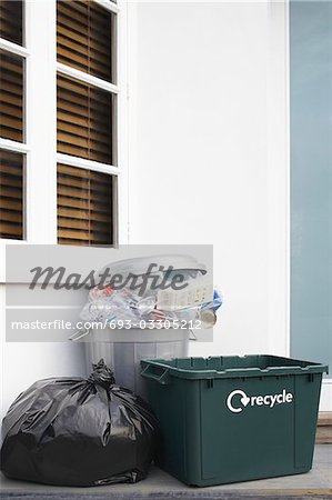 Garbage containers outside building