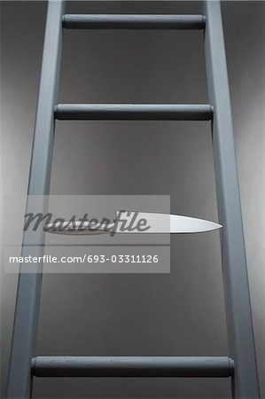 Kitchen knife in place of step in ladder