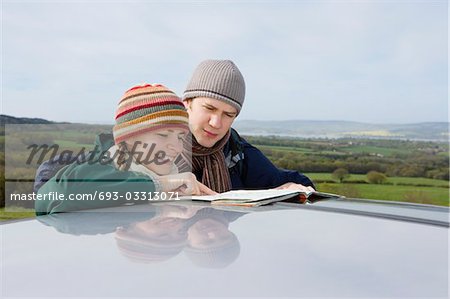 Couple Consulting a Map