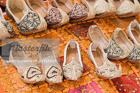 Dubai, UAE, Genie style sandals are for sale in the Bur Dubai souq in women’s and children’s sizes.