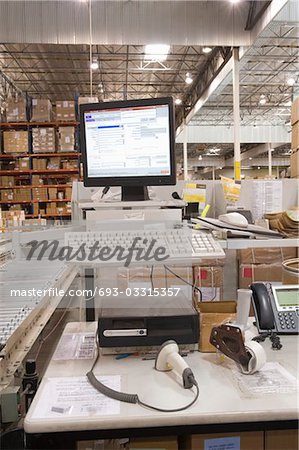 Computer screen in distribution warehouse