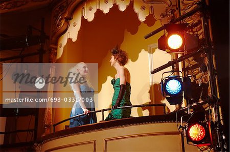 Young women in theatre box