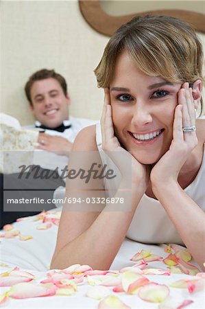 Bride and groom relaxing, close-up of bride