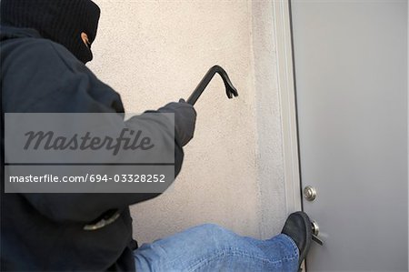 Einbrecher quicklebendig Tür des Hauses