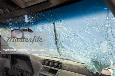 Broken windshield of car, view from interior