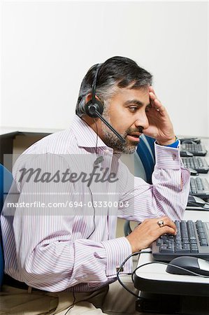 Geschäftsmann mit Telefon-Headset