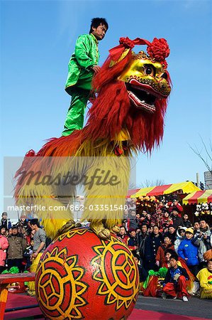 China,Beijing. Beiputuo temple and film studio. Chinese New Year Spring Festival - lion dance performers.