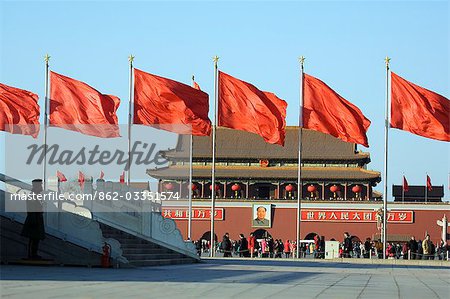 China,Beijing. Chinese New Year Spring Festival - flags and red lantern decorations on the Gate of Heavenly Peace in Tiananmen Square.